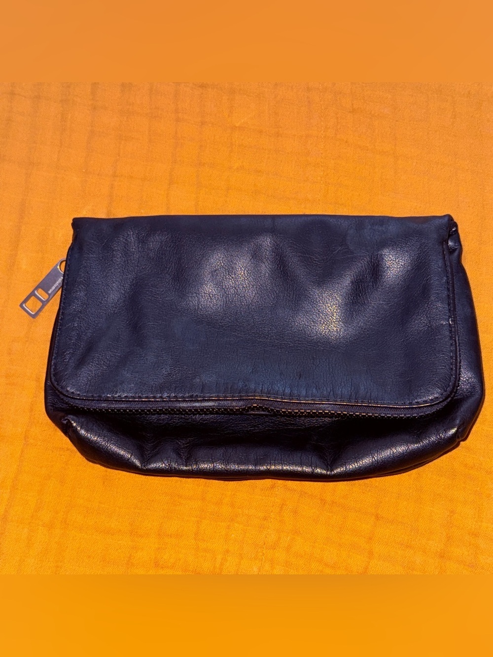 Lululemon black fold over clutch